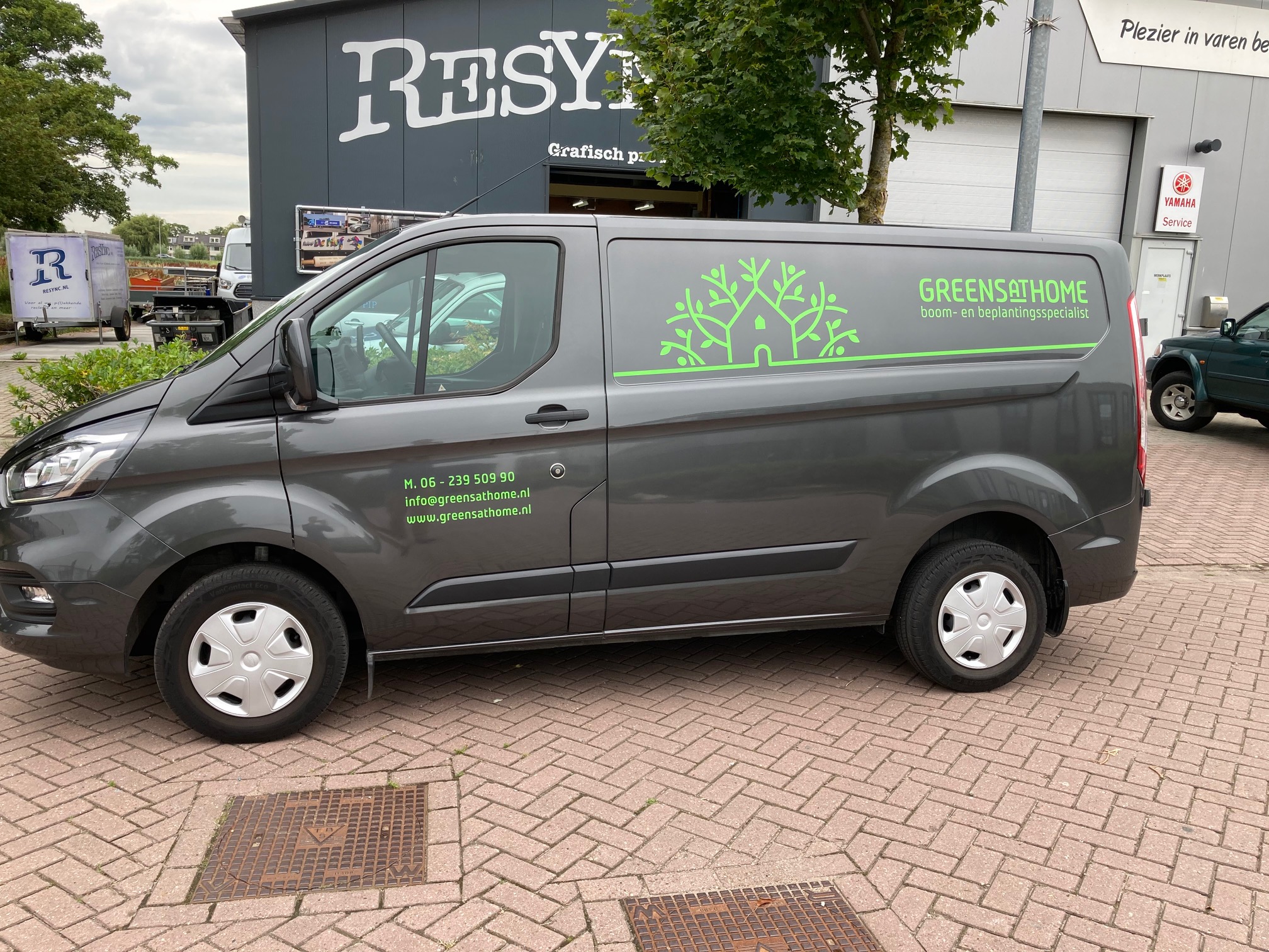 Busbelettering Greensathom